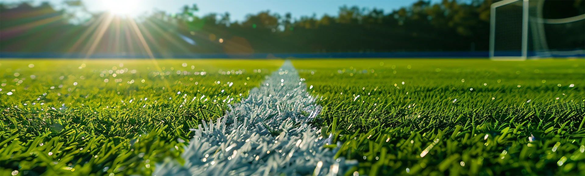 Close-up shot of an outdoor football field with artificial grass