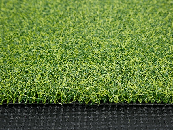 Close-up of grass fibers and the bottom turf sample