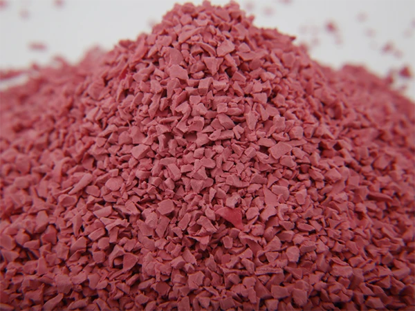 Loose magenta EPDM granules